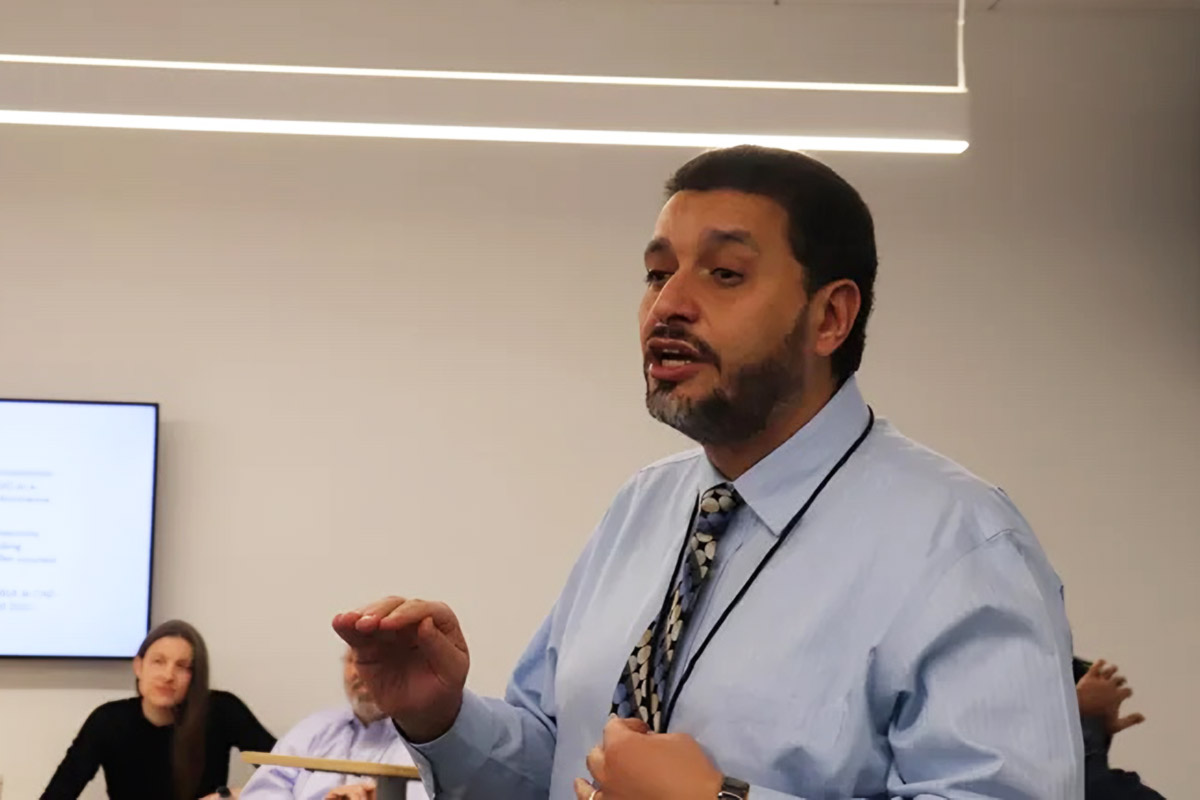 Waleed Farag lecturing to cybersecurity students at Indiana University of Pennsylvania.